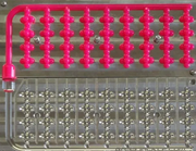Salmon egg cluster mold shown with pink soft plastic eggs